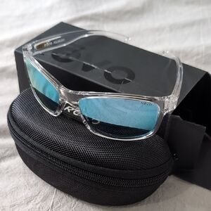 Revo Crystal Clear Sunglasses with Blue Lenses